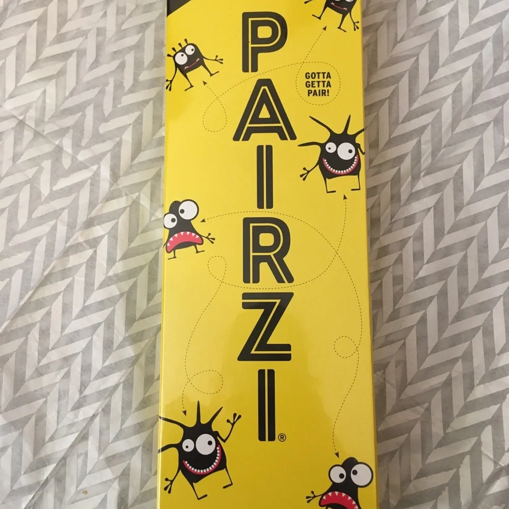 PAIRZI CARD GAME A hit from the franchise of TENZI, SLAPZI,ITZI. PAIRZI Game